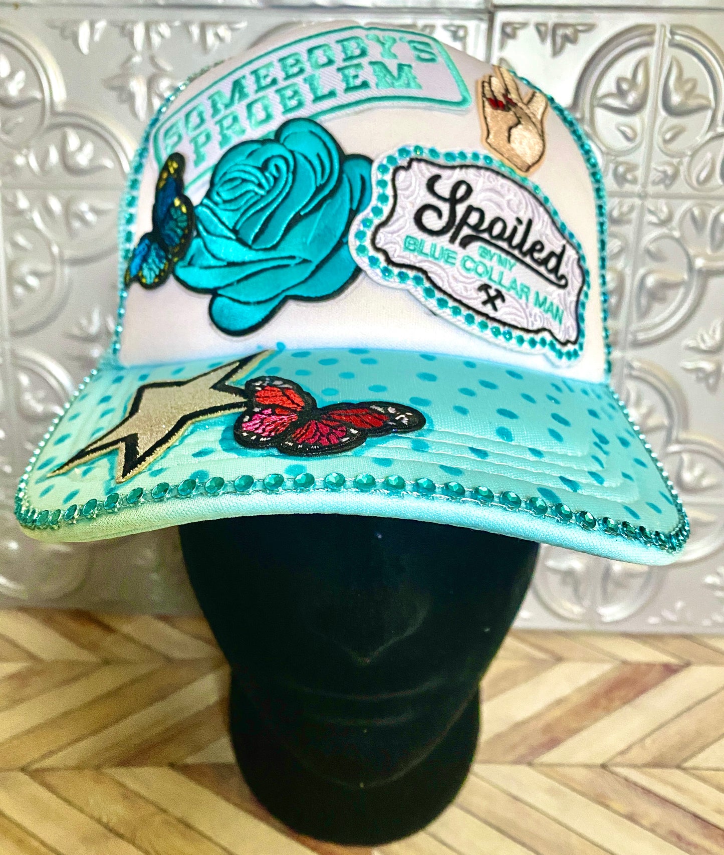 Somebody’s Problem Decorated Truckers Hat in Light Blue & White
