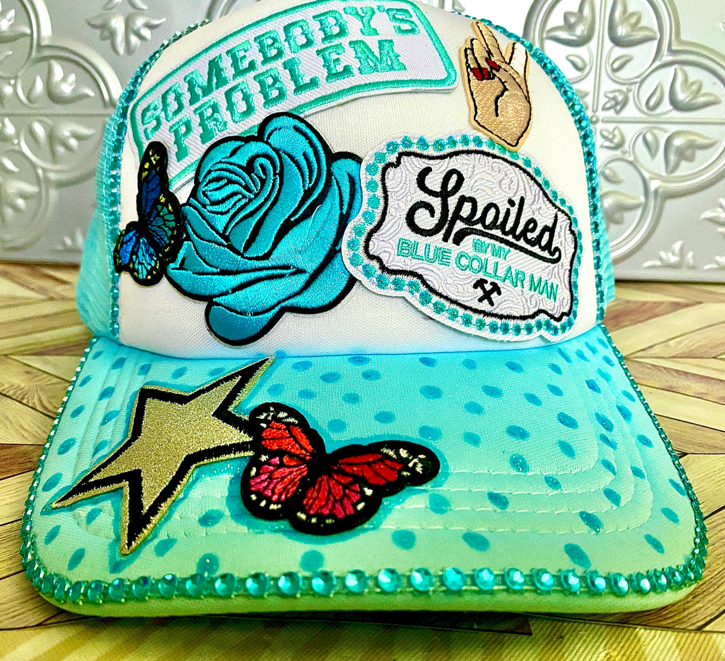 Somebody’s Problem Decorated Truckers Hat in Light Blue & White