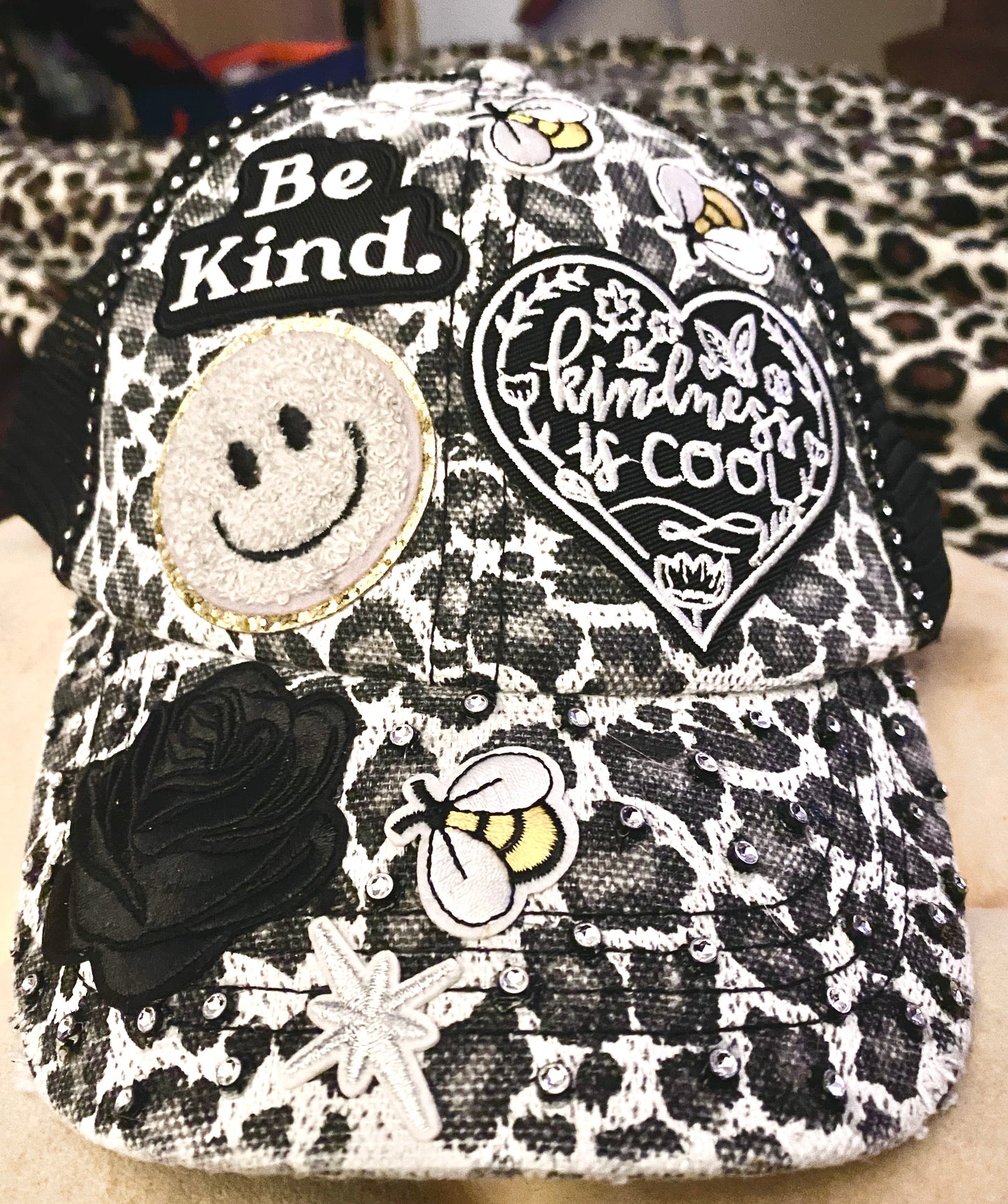 Be Kind Distressed Leopard Print Decorated Snap Back Hat in Black & White