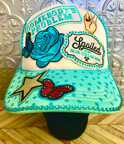 Somebody’s Problem Decorated Truckers Hat in Light Blue & White