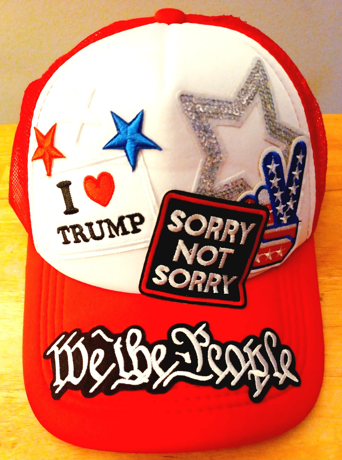 Sorry Not Sorry We the People Love Trump, Truckers Hat in Red & White