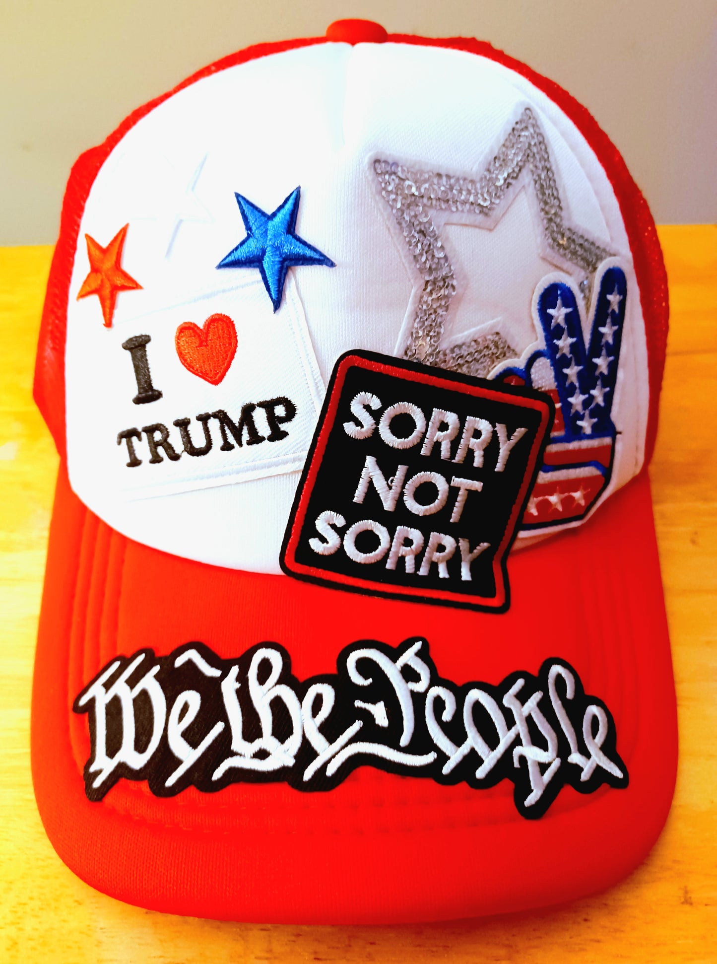 Sorry Not Sorry We the People Love Trump, Truckers Hat in Red & White
